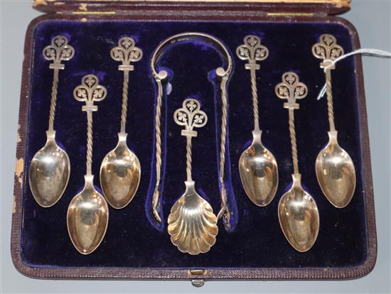 A Victorian cased set of six silver teaspoons, tongs and caddy spoon, by Jehoiada Alsop Rhodes, Sheffield 1878.